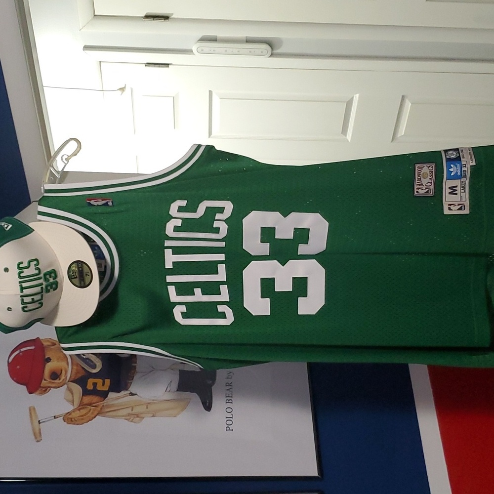 Authentic  used adidas green Larry Bird celtics   jersey with matching hat.
